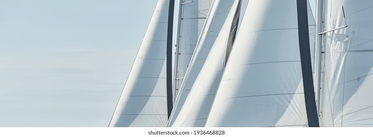 Some Sails Of White Color, Sailboats Compete In A Sailing Regatta At Sunset, Sailing Race