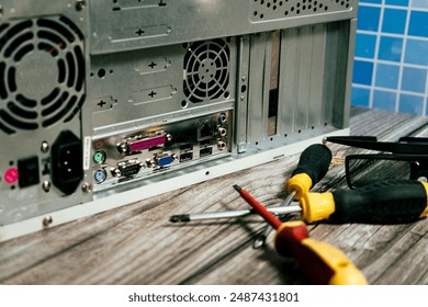 A some tools to repair a computer.
