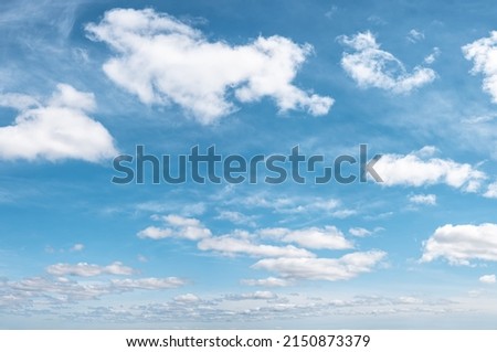 some white whispy clouds and blue sky cloudscape. blue sky with white cloud background. turquoise sky with different types of clouds.