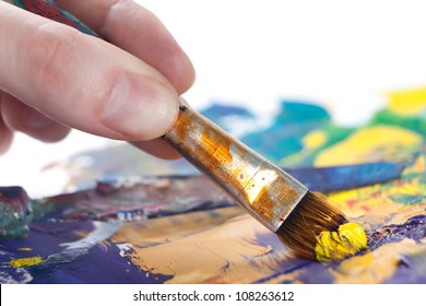 Somebody is painting some picture with paintbrush, isolated on white background - Powered by Shutterstock