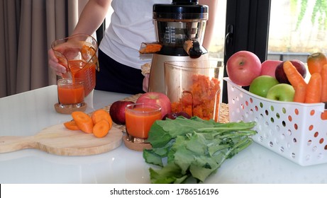 Someone Is Making Fruit And Vegetable Juice