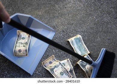 Someone Sweeping Up Ten Dollar Bills Off The Ground.  A Reference To Collecting Up Money Or Sweep Stakes