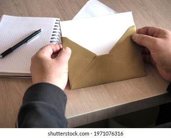 Someone Who Opened The Envelope On The Table