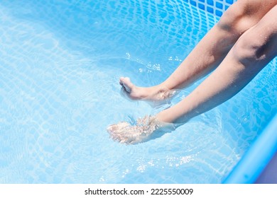 Someone's Feet In The Water While They Are Getting Ready To Jump Into The Pool For Their Next Swim