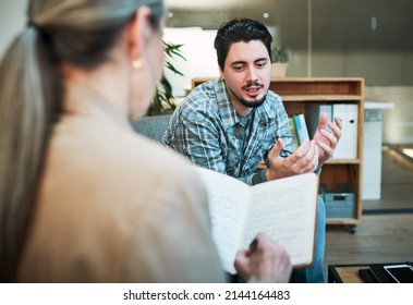 Sometimes I feel like.... Shot of a young man having a therapeutic session with a psychologist and looking upset. - Shutterstock ID 2144164483