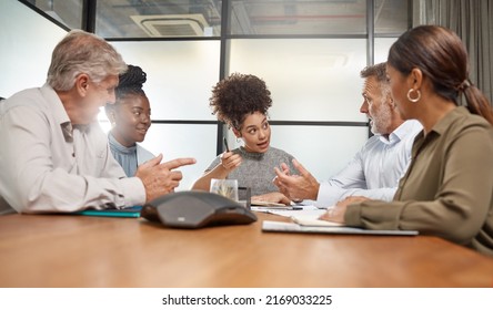 Sometimes you have to have difficult conversations. Shot of a group of businesspeople in a meeting at work.