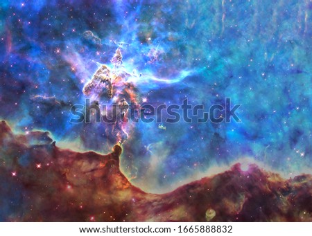 Somewhere in deep space. Carina Nebula and Mystic Mountain complex. Science fiction wallpaper. Elements of this image were furnished by NASA.