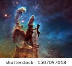 Somewhere in space near Pillars of creation. New view of the Pillars of Creation. Science fiction. Elements of this image were furnished by NASA/ESA