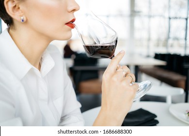 Sommelier Tasting Red Wine. Elegant Woman With Red Lips Ready To Drink Red Wine