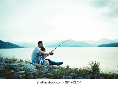 Son And Dad Fishing At Dam,vintage Tone