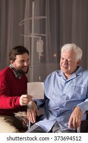 Son visiting disabled father in nursing home