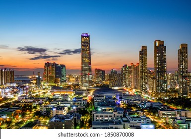 Songdo, Yeonsu-gu, Incheon, South Korea - September 25, 2020: Aerial And Night View Of Highrise Apartments And Northeast Asia Trade Tower At Songdo International City