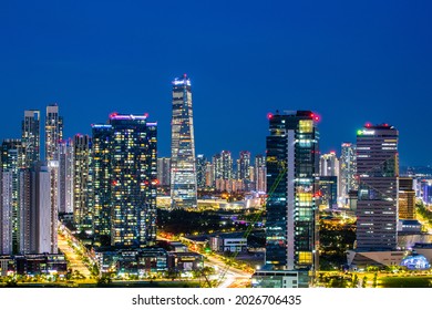 Songdo, Yeonsu-gu, Incheon, South Korea - June 16, 2021: Aerial And Night View Of Northeast Asia Trade Tower And High-rise Apartments At Songdo International City
