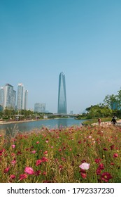 Songdo,South Korea-June 2020: Posco Tower Songdo,Northeast Asia Trade Tower With A Flower Garden And River View At Songdo Central Park