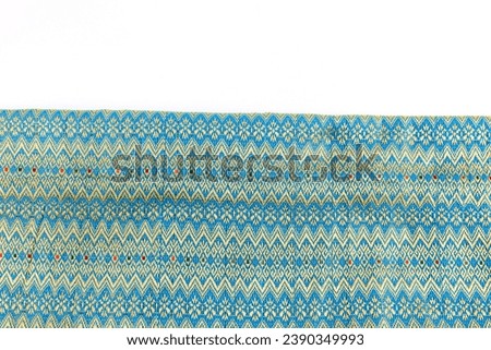 Songket cloth is a cloth that has luxurious motifs and textures and is one component that should not be missed when wearing traditional clothes typical of West Sumatra or Minangkabau. 商業照片 © 