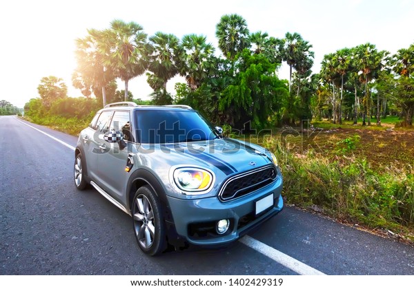 Songkhla, Thailand - April 13, 2019 : MINI COOPER\
Countryman on New model sports car with strong. Car driving on the\
road with confidence With enhanced performance with safety on the\
road in travel.