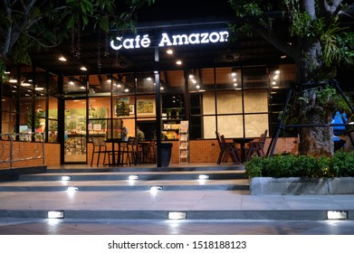 Songkhla, Thailand - September 9, 2019 : Cafe Amazon beverage shop with nature environment in Ptt oil and gas station at night. A famous Thai franchise coffee shop