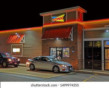 
Sonic Restaurant Drive Through Window, Customer Food Order Pick Up, Lynnfield Massachusetts USA, September 7, 2019