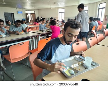 Sonipat, Haryana India- August 29 2021: College Students And Children Eating Nutritious Food For Lunch And Dinner At Hostel Canteen Or Mess.