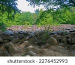 The Sonorous Stones of Ringing Rocks Park, near Falls Creek Waterfall in Bucks County, Pennsylvania.