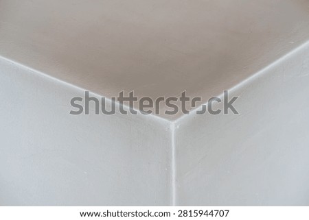 Soot and smoke damage on interior wall and ceiling corner near junction