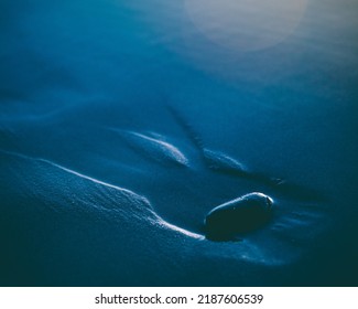 Soothing Blue Abstract Photograph Of A Rounded Sea Stone In The Sand At Dusk, Oregon Coast