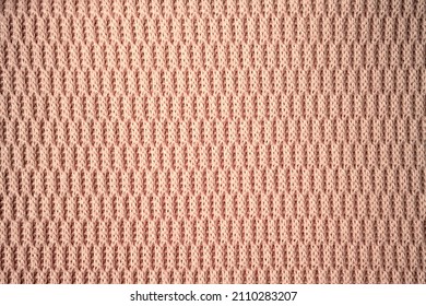 Soothing Coral Knitwear Lies On The Table. View From Above