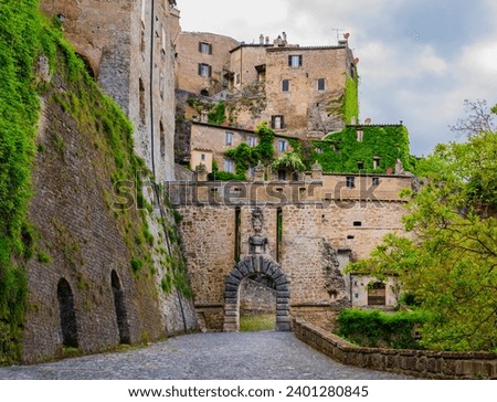 Sorano, Tuscany, Italy: stunning view of the ancient city gate Porta dei Merli
