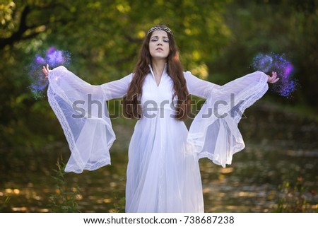 Sorcerer practicing magic in the forest