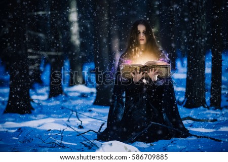 Sorceress celebrating the magic of the magic books