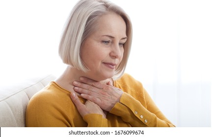 Sore throat woman. Concept photo with indicating location of the pain.