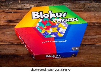 Sorel-Tracy, Canada - December 12 - 2021: View Of Blokus Trigon Strategy Board Game On Wood Plank Table.n Abstract Strategy Game From The Makers Of Blokus. 