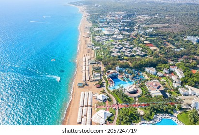 Sorgun. Side. The resort village of Titreyengol on the shores of a trembling lake in Turkey. There are many four and five star hotels around the lake. Beach and Mediterranean Sea. Drone shooting - Shutterstock ID 2057247719