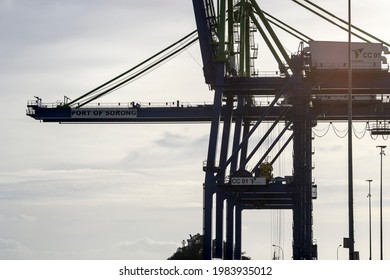 Sorong, West Papua, Indonesia, May 31st 2021. The silhouette of Quay Gantry Crane (QC), Ship to Shore Crane  (STS) at  yard of Sorong harbor.