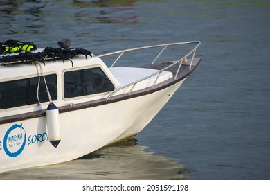 Sorong, West Papua, Indonesia, September 30th 2021. A Fiber Speed Boat Mooring At The Wooden Pier