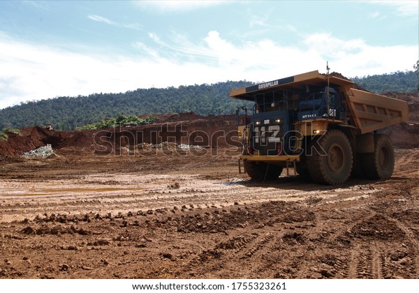 SOROWAKO,\
INDONESIA-AUGUST 1, 2019: A haul dump trucks used to transport\
mining material in the nickel mining of PT. Vale Indonesia in\
Sorowako, East Luwu, South\
Sulawesi.