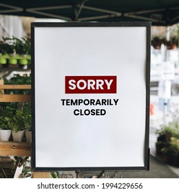 Sorry temporarily closed shop sign mockup