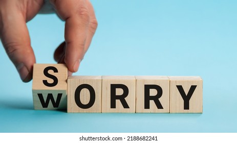 Sorry To Worry. Hand Turns A Cube And Changes The Word Worry To Sorry. Business Concept, Copy Space.