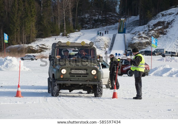SORTAVALA, RUSSIA -\
FEBRUARY 18, 2017: UAZ-469 comes for start. The open championship\
on sports tourism of the Republic of Karelia \