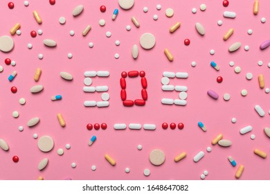 SOS Morse Code With Medical Drugs And Pills, Top View Flat Lay Conceptual Image For Addiction And Overuse Of Medication