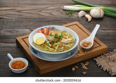 Soto ayam is a typical Indonesian food in the form of a kind of chicken soup with a yellowish sauce.