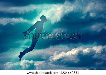 Soul Ascension. Ghost of a man taken up into heaven. Afterlife, meditation and dream concept