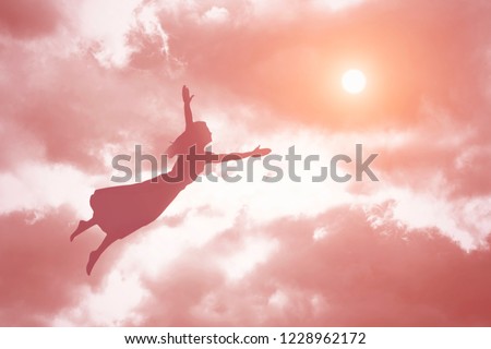 Soul of a woman ascends to heaven. Afterlife, meditation and dream concept