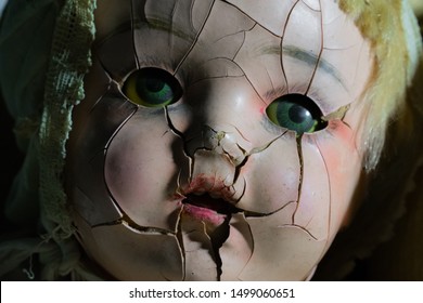 creepy broken doll