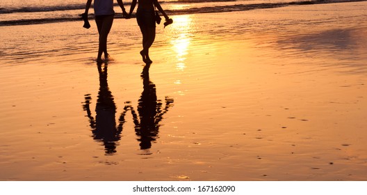Soulmate - Couple Walking On The Beach