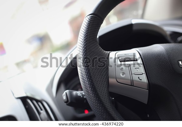 Sound audio music and phone\
function control button on the left hand side of car steering\
wheel
