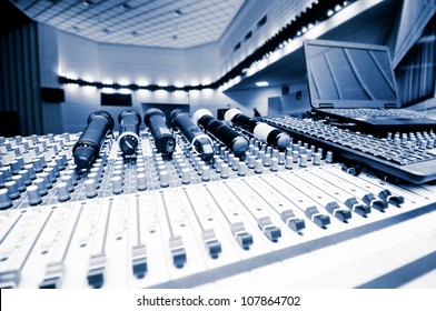sound board and microphones in the concert hall.