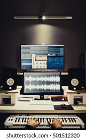 Sound Engineer, Composer Working In Digital Editing & Recording Studio For Post Production Or Broadcasting