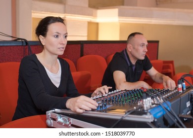 Sound Engineer At A Studio Mixing Desk