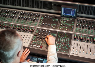 Sound engineer working in studio